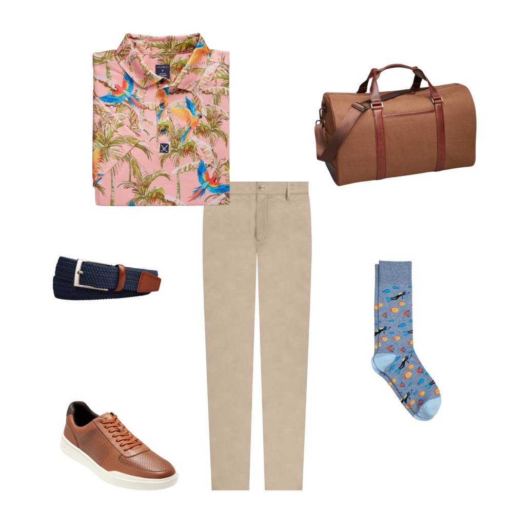 Jos A Bank Outfit featuring a peach Hawaiian shirt with parrots on it, khaki pants, colorful fish dress socks, brown leather sneakers, a dark navy blue belt with brown accents and a brown weekender bag for the eTail West style Edit