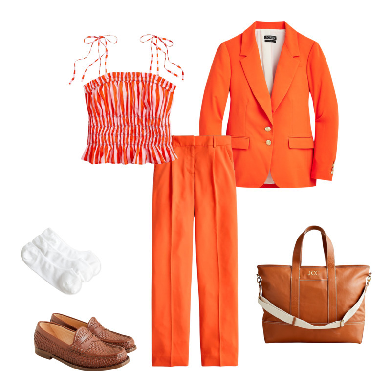 J Crew Outfit featuring a hot orange suit, Orange and white striped spaghetti strapped top, with white ankle socks, brown loafers, and a brown leather bag for the eTail West Style Edit